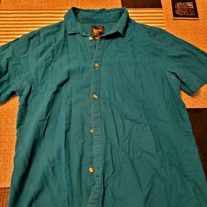 Cuidado con el Perro, Size Large, used good condition, teal in color.